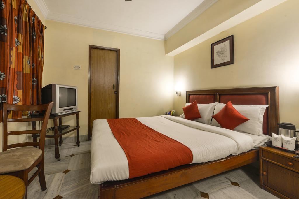 Camac Plaza Hotell Kolkata Rom bilde