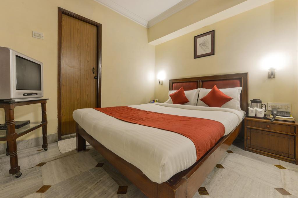 Camac Plaza Hotell Kolkata Rom bilde